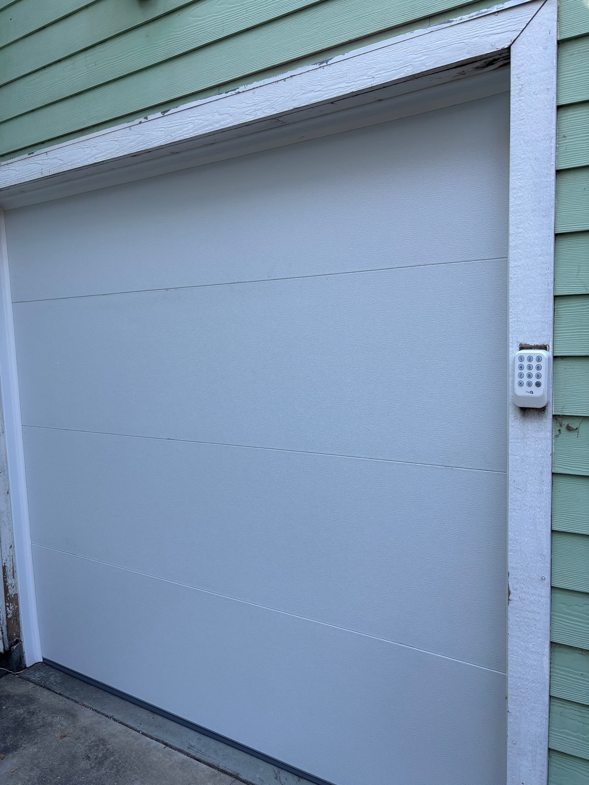 Gallery photos for Single Flush Panel Garage Door Installation in Downtown San Jose: Image #2