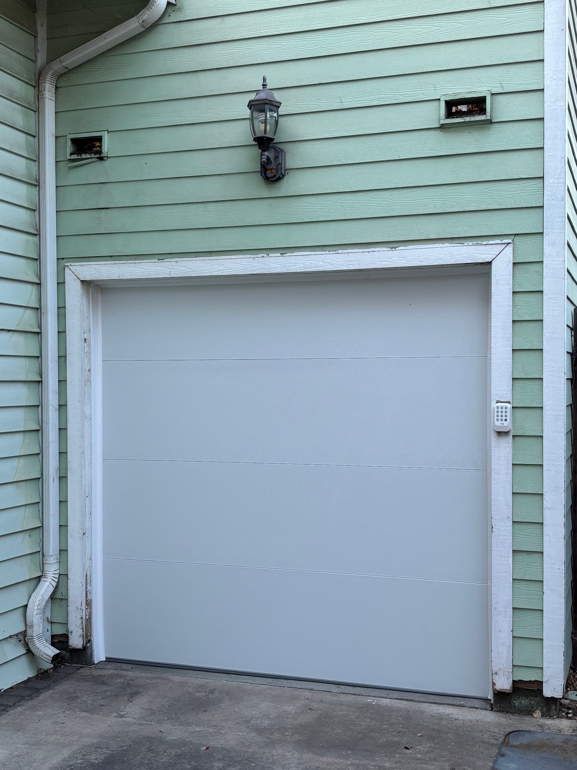 Single Flush Panel Garage Door Installation in Downtown San Jose image